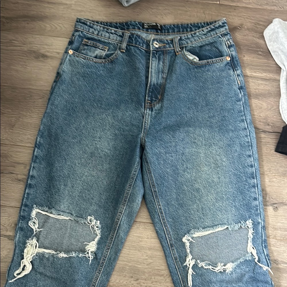 Distressed Blue Jeans